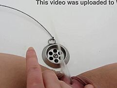 A collection of pissing pussy videos featuring a mature woman who urinates in the bathtub, with close-up shots and ASMR effects
